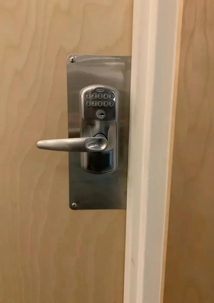 Keypad door lock installation in Montreal by professional locksmith.